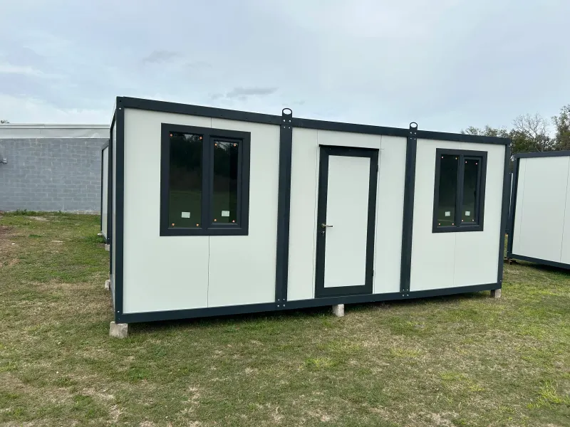 TRIMOD 20 by 8 foot mobile office, front view with two windows and a steel door
